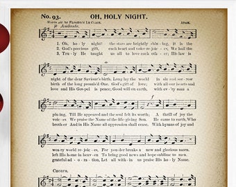 May include: Vintage sheet music for the Christmas carol "Oh Holy Night". The sheet music is printed on aged paper with a brown background and black text. The music notes are printed in black and the lyrics are printed in black. The title of the carol is printed in large, bold letters at the top of the sheet music.