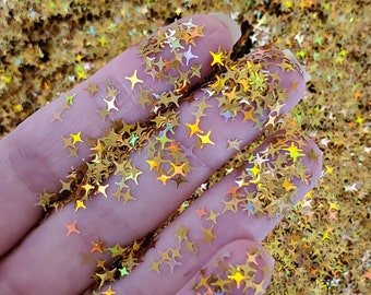 Holographic Gold 4-Point Star Glitter for face nail art, Glitter for tumbler resin, Craft glitter supplier, Holo Gold 4-Point Star Glitter