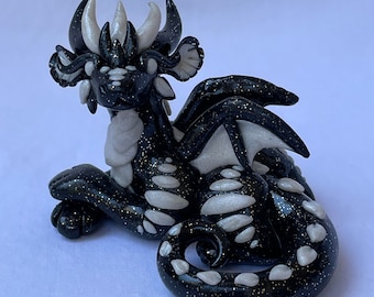 Sparkly black and white polymer clay dragon