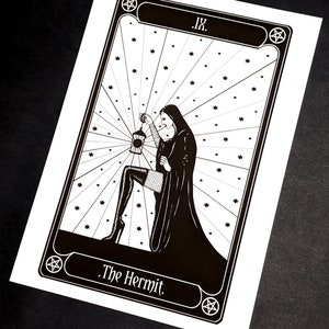 May include: Black and white tarot card illustration of The Hermit, a woman in a hooded robe holding a lantern, with a pentagram and the Roman numeral IX in the top corners.