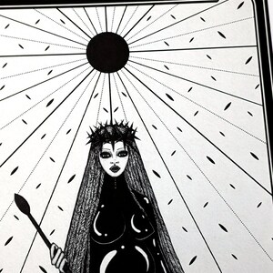 May include: Black and white illustration of a woman wearing a crown of thorns and a long black dress. She is holding a staff and standing in front of a black sun with rays emanating from it. The text "III." is at the top of the image.