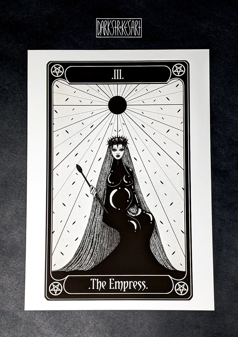 May include: Black and white illustration of The Empress tarot card. The card features a woman wearing a crown and a veil, holding a staff. The card is surrounded by a pentagram and the Roman numeral III.