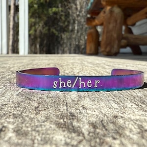 she/her Pronoun Bangle – Rainbow Stainless Steel Bracelet – Hand Stamped Pride Jewelry – LGBTQ+ Inclusive Gift – Canadian Handmade