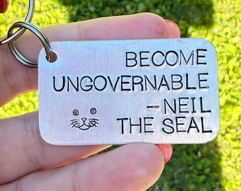 Become ungovernable — Neil the Seal keychain