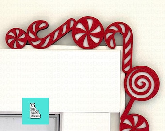 May include: Red and white candy cane and peppermint design corner trim. The trim is made of wood and is perfect for adding a festive touch to your home decor.