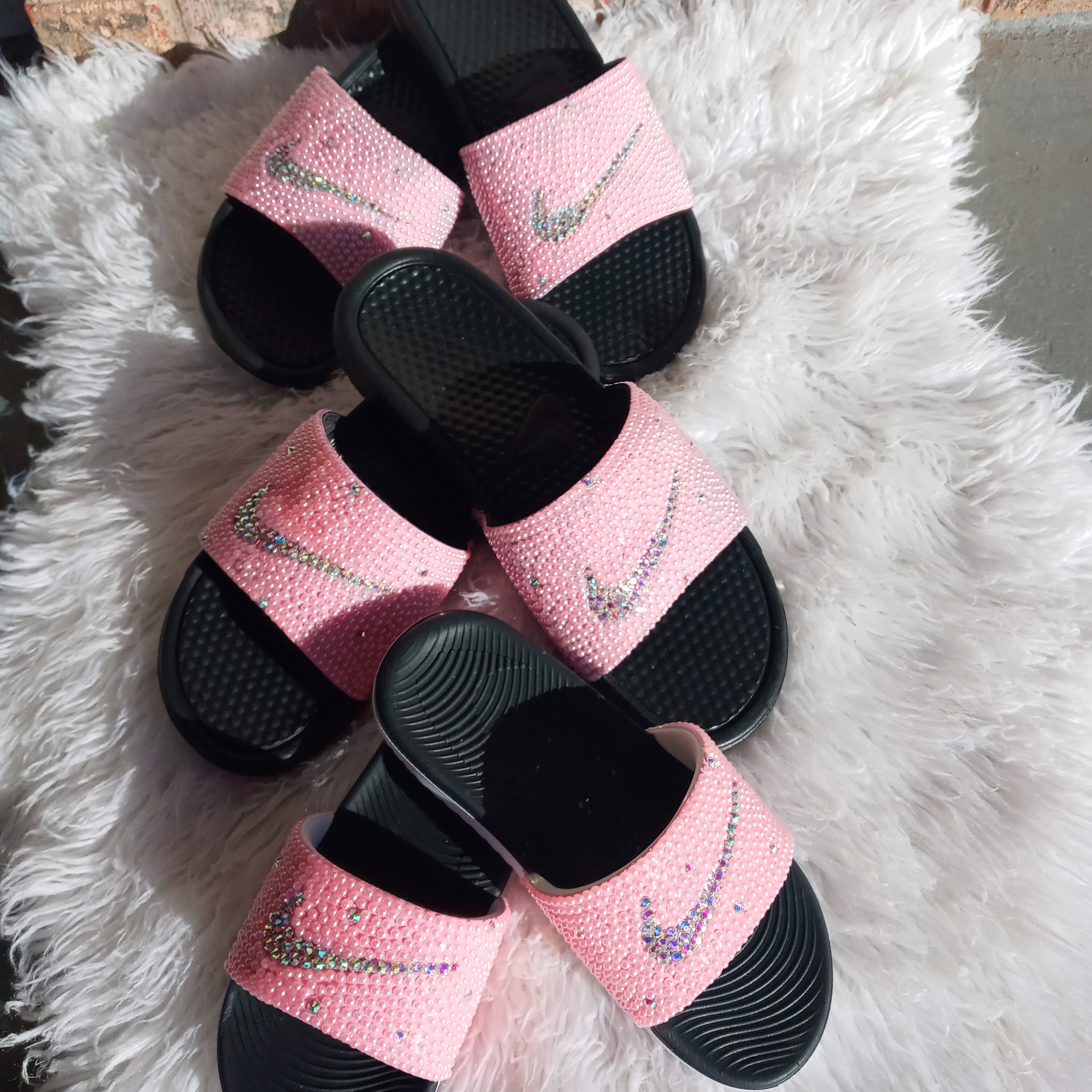 blush pink nike slides