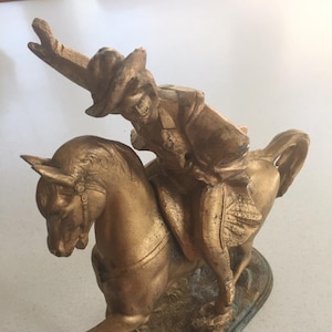 Victorian cast spelter clock topper, alloy metal, man on a horse, ME MOORE B&PCo