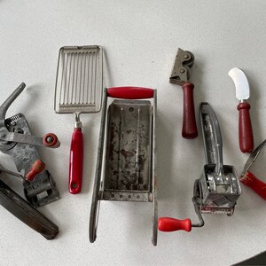 Vintage red handle kitchen hand tools, farmhouse kitchen, buyers choice, collectibles. lot #4