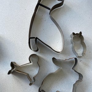 Vintage metal cookie cutters, gingerbread men, christmas cookies, cooky cutters, farmhouse decor, lot #2, set of 4, animal shaped.