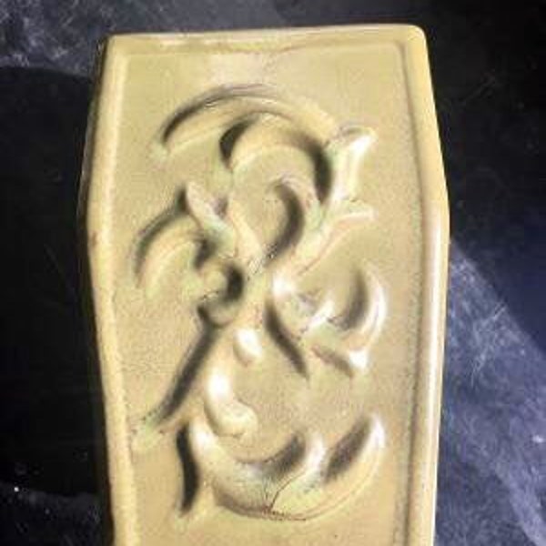 Avocado square vase with fleur de lis design