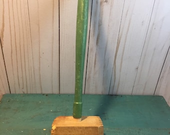 vintage wooden handle potato masher, meat tenderizer, wooden hammer, green handle, retro kitchen