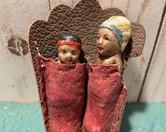 Vintage bisque dolls, pair of dolls depicting native Americans, dolls in papoose, red leather bunting carrier, Indian souvenir,