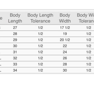 May include: Size chart for clothing with measurements in inches for body length and width. The chart includes sizes XS through 4XL with a 1/2 inch tolerance for both length and width.