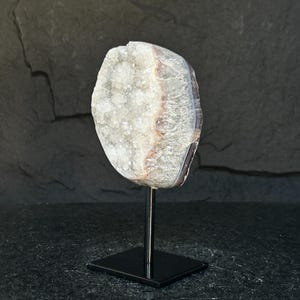White quartz on stand, Geode with metallic base included for home decoration