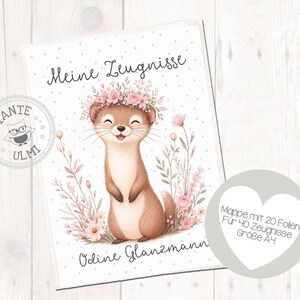 Könnte beinhalten: Eine weiße A4-Mappe mit einer Illustration eines braunen Wiesels mit rosa Blumenkranz, umgeben von rosa Blumen. Der Text lautet Meine Zeugnisse und Odine Glanzmann. Ein kreisförmiges Logo mit einer Eule und dem Text Tante Ulmi ist abgebildet.