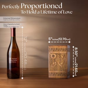 Rosewood hummingbird urn shown next to a wine bottle for scale comparison. Illustrates the physical size of this wooden cremation urn, featuring the clear hummingbird and floral design. Helps visualize the memorial box dimensions.