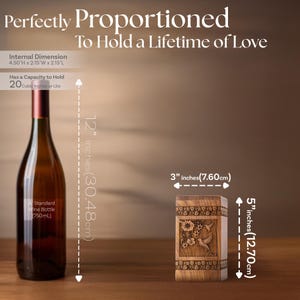 Rosewood hummingbird urn shown next to a wine bottle for scale comparison. Illustrates the physical size of this wooden cremation urn, featuring the clear hummingbird and floral design. Helps visualize the memorial box dimensions.