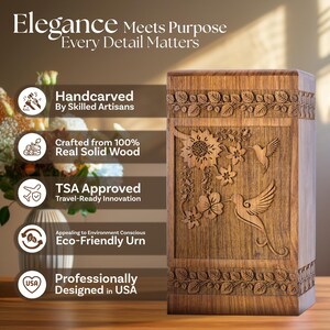 Rosewood hummingbird urn displayed respectfully on a wooden mantelpiece next to a small vase of flowers. Shows the urn in a home setting, highlighting its decorative quality as a beautiful floral memorial. Provides context for the adult urn size.