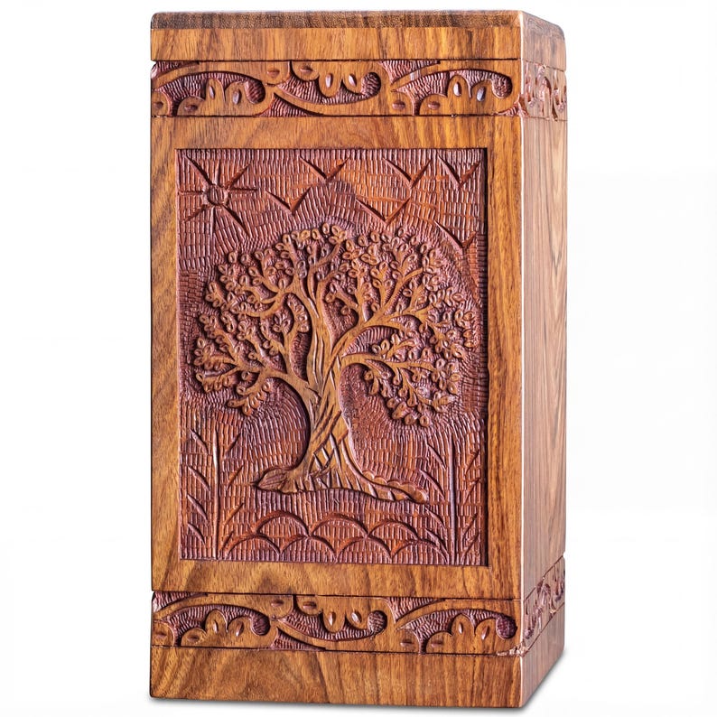 Rosewood Tree of Life urn with peaceful birds, handmade from solid, legally sourced wood, shown in multiple lifestyle scenes for ashes burial, home memorial display, columbarium niches and scattering in nature. Features secure sliding bottom opening with screw, TSA-approved design for travel, and size options from keepsake to XX-large family urn. Warm, comforting finish blends with modern décor, creating a meaningful, dignified tribute and thoughtful sympathy gift.