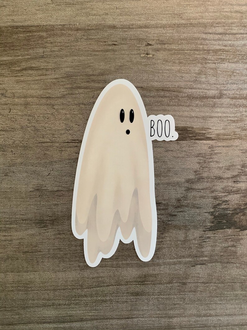 May include: A white ghost with black eyes and a surprised expression. The ghost is saying "BOO."