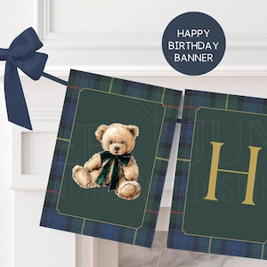May include: A navy blue bow and a banner with a plaid design. The banner has a teddy bear illustration with a green bow tie. The banner also has the text "HAPPY BIRTHDAY BANNER" in a navy blue circle.