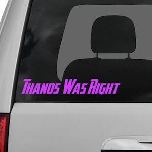 May include: A purple vinyl sticker with the text "THANOS WAS RIGHT" on a silver car.