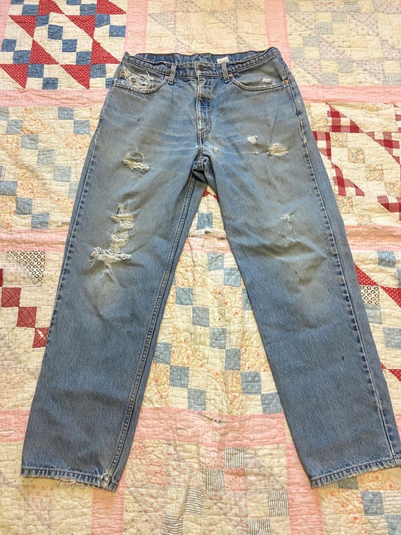 Vintage 90s Levis 550 distressed 34 waist