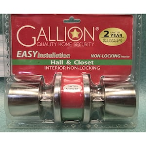 May include: A Gallion brand satin nickel interior door knob set in clear plastic packaging. The red and green cardboard backing features the text Gallion Quality Home Security, Easy Installation, Non-Locking Interior, and Hall & Closet.