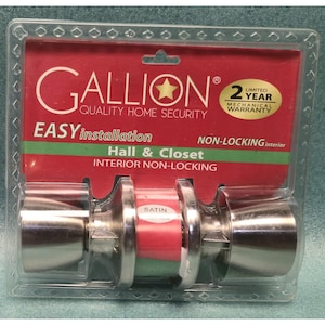 May include: A package containing a pair of satin nickel door knobs. The packaging is red with the brand name "Gallion" and the text "Easy Installation". The knobs are designed for hall and closet interior non-locking doors.
