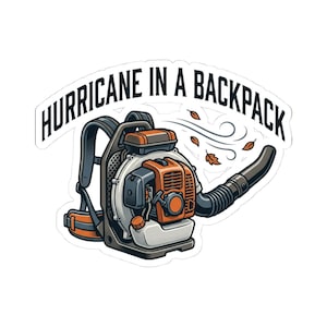 May include: A sticker featuring a backpack leaf blower in orange, grey, and black. The text HURRICANE IN A BACKPACK is arched above the blower, with stylized wind lines and small brown leaves blowing from the nozzle to the right side.