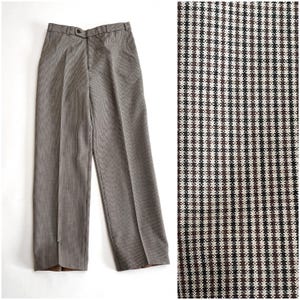 May include: Brown and white plaid pants with a cuffed hem.