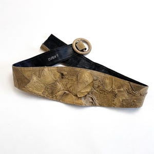 1970-tals läderbälte brett brunt Caruso vintage midjebälte med lappmönster och reptilmönster