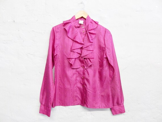 pink blouse with ruffles