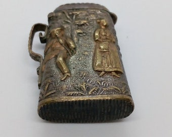 Antique vesta, late 19th century in the form of a jug.