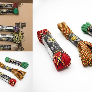 May include: Assortment of Dr. Martens shoelaces in various colors and patterns, including red, green, yellow, and blue. The laces are packaged in plastic and labeled "original laces".