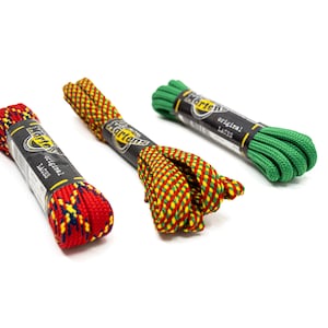 May include: Three pairs of Dr. Martens shoelaces in different colors and patterns. The laces are red and yellow, green and yellow, and green. Each pair has a Dr. Martens label with the text "original laces".