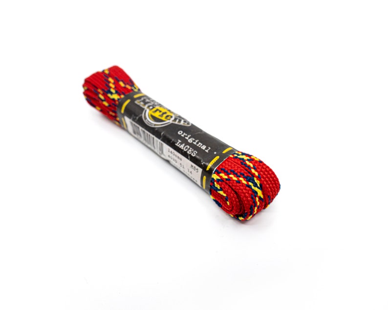 May include: Red, yellow, and blue shoelaces with a black label that reads "Dr. Martens original laces".