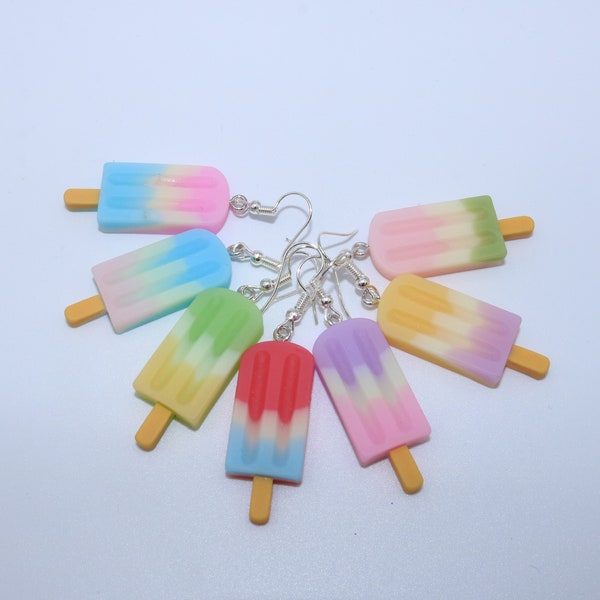 Handmade colorful and summery earrings with tricolor resin pendant in the shape of ice cream sticks, eskimos