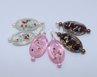 Handmade earrings with oval white, pink and purple transparent glass beads with colored accents