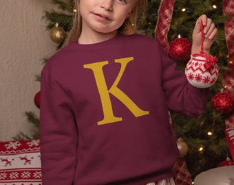 ron and harry christmas jumpers