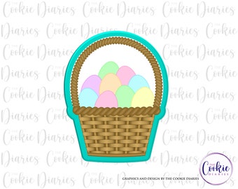 May include: A turquoise blue cookie cutter shaped like a basket filled with pastel coloured eggs. The basket has a woven brown texture.
