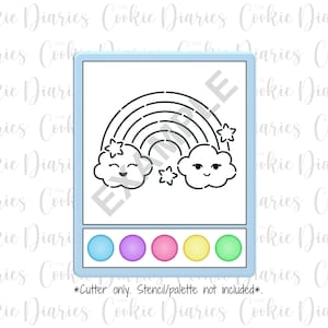 May include: A cookie cutter featuring a rainbow, clouds, and stars design. The cutter is in a light blue frame with a row of colourful circles at the bottom. The text "*Cutter only. Stencil/palette not included*" is at the bottom.