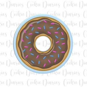 May include: A chocolate frosted donut with pink and blue sprinkles on a light blue background.