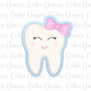 May include: A light blue tooth cookie cutter with a pink bow and a smiling face.