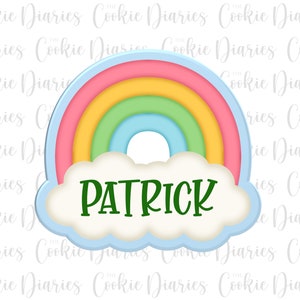 May include: A blue and white cloud with a rainbow arch above it. The name "PATRICK" is written in green letters on the cloud.