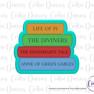 May include: A turquoise blue cookie cutter shaped like a stack of four books. The top book is orange and says "LIFE OF PI". The second book is green and says "THE DIVINERS". The third book is red and says "THE HANDMAID'S TALE". The bottom book is blue and says "ANNE OF GREEN GABLES".