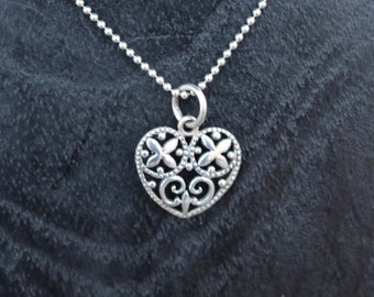 Sterling Silver Heart Pendant With Floral Design