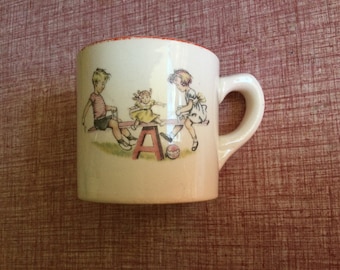 Vintage Baby Cup/ Mug with 3 kids at play on a Seesaw