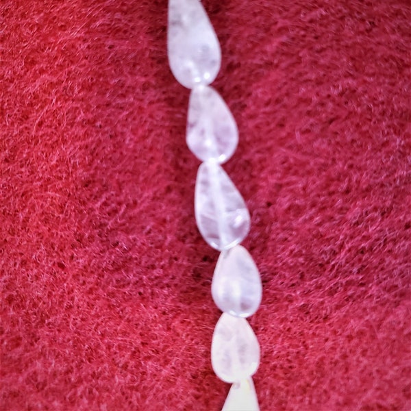 13" strand Rainbow Moonstone Flat Teardrop.  8mm x 5mm Center-drilled.  Beautiful internal glow within this Moonstone is has to be the Moon!