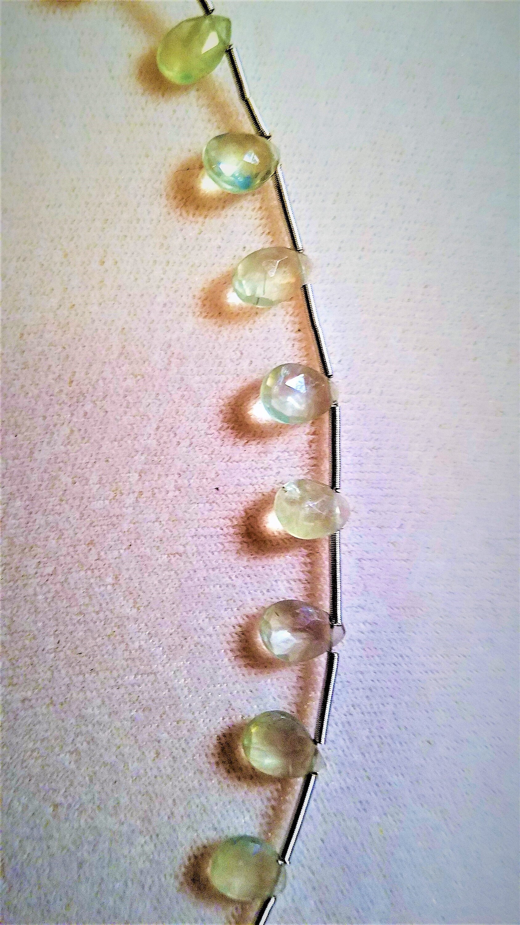 9 Strand Prehnite Faceted Teardrop Beads. 15 -